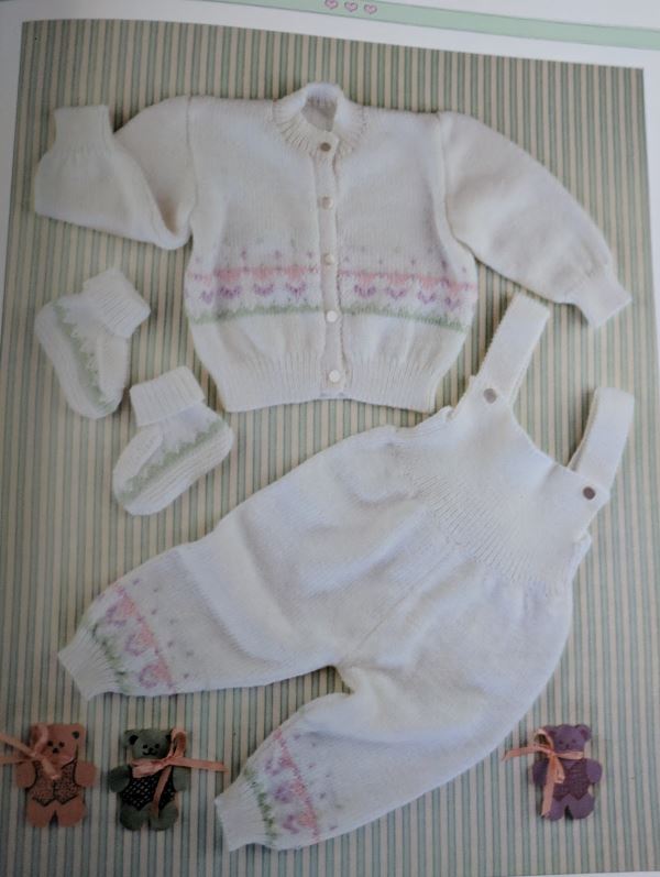 Baby knitting pattern set with cardigan overalls and booties